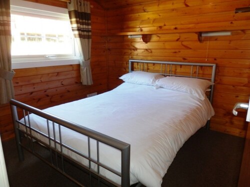 Cozy Norwegian log cabin in Snowdonia on Trawsfynydd Holiday Village