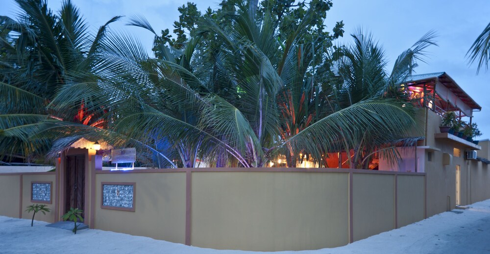 Hotel Front - Evening/Night