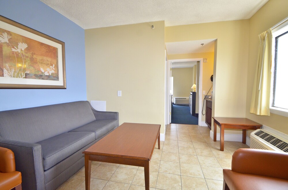 Room, Coastal Palms Inn & Suites