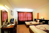 Triple Room, Bathtub, City View