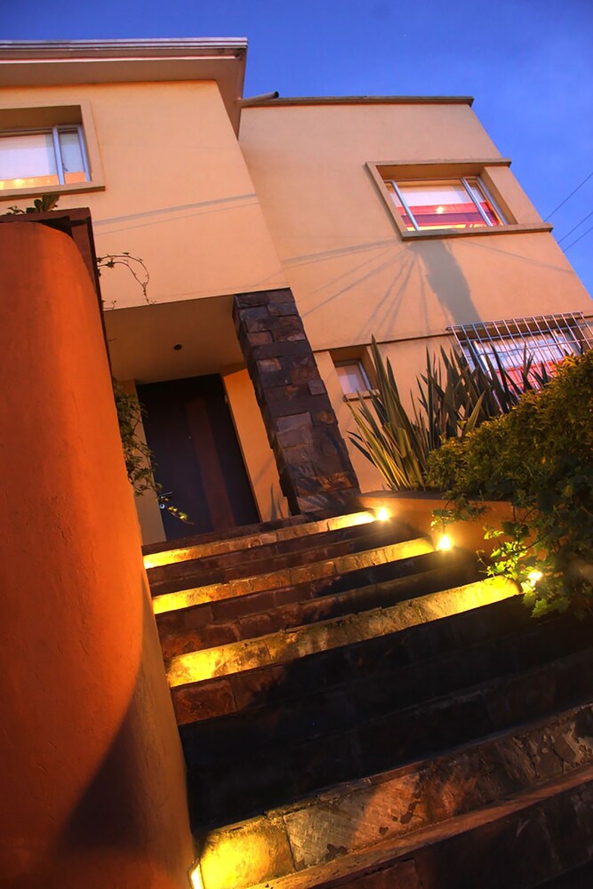 Hotel Front - Evening/Night