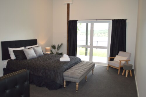Serene Lakeside Escape in Brand New Luxury House!