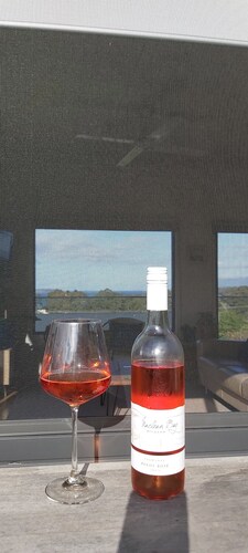 Stunning water views; relaxed coastal atmosphere; multiple entertaining areas
