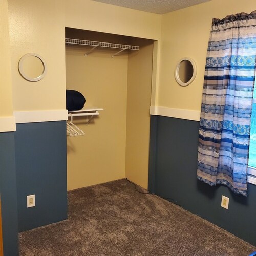 Family friendly home, 2 car garage parking with private lake access and dock.