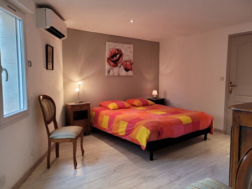 Appartement en rez de jardin de villa