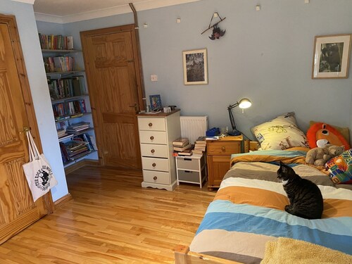 Welcoming, peaceful family home with stunning rural views right next to town