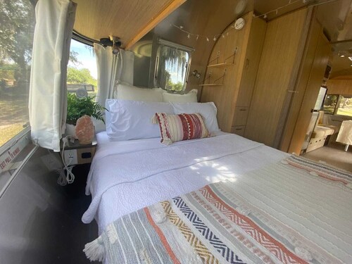 Waterfront Luxury Airstream on An Orange Grove