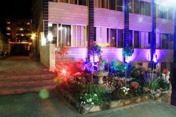 Hotel Front - Evening/Night
