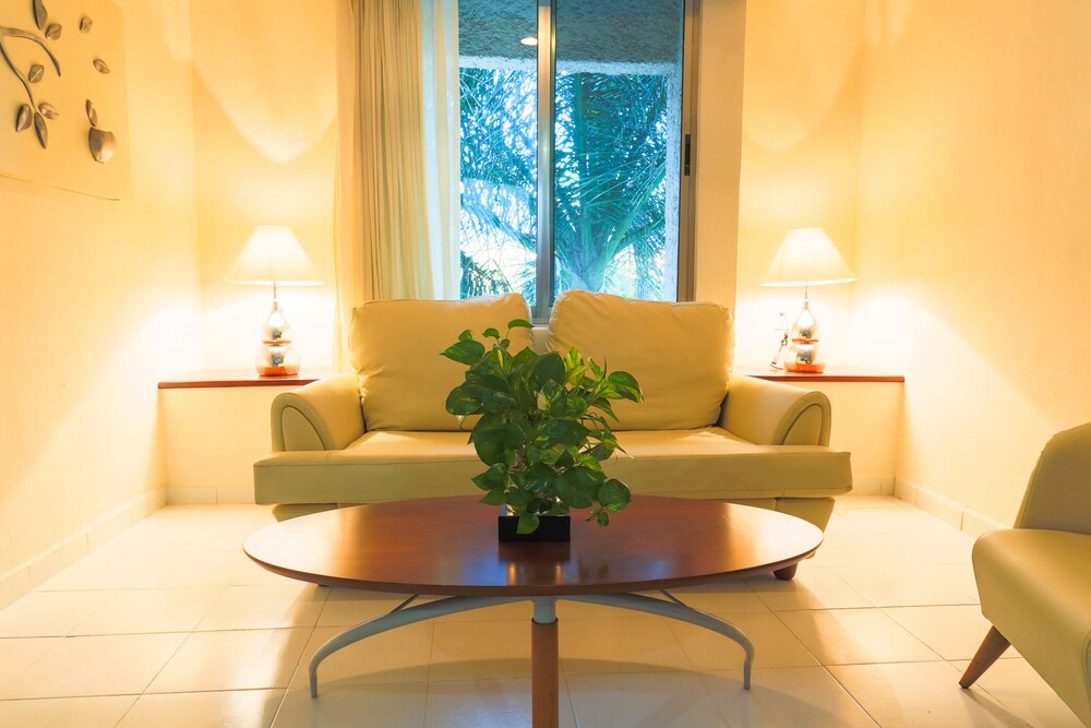 Master One Bedroom Suite with 1 Queen bed with Balcony - Living Room
