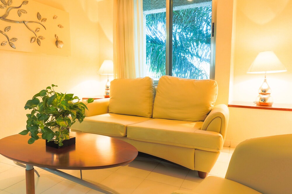 Master One Bedroom Suite with 1 Queen bed with Balcony - Living Room