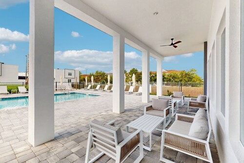 Two-story, dog-friendly townhouse with a lanai, private pool, & washer/dryer