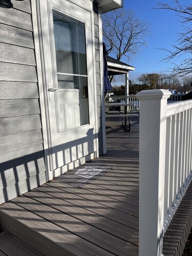 Cozy riverfront cottage with an easy beach-inspired coastal MI vibe!