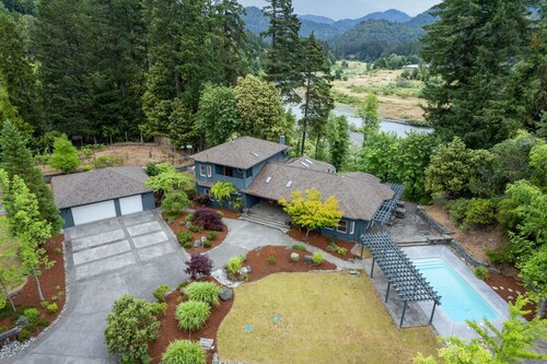 Enjoy the Serenity and Quiet on this 5-acre Estate with Mountain and River Views