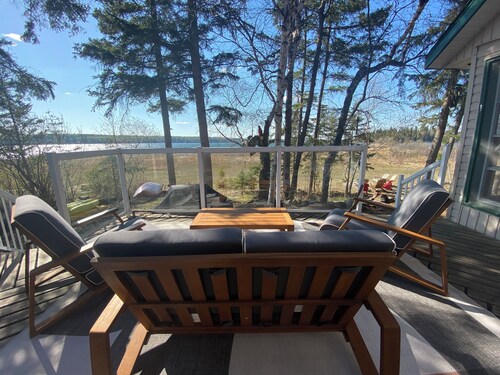 Cozy lake-front A-frame cabin at Emma Lake. Steps away from the beach!