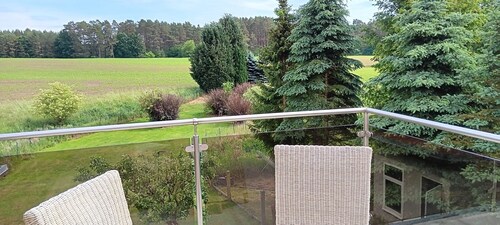 Ferienhaus 'Zur Schmiede' mit privater Terrasse, privatem Garten und Balkon