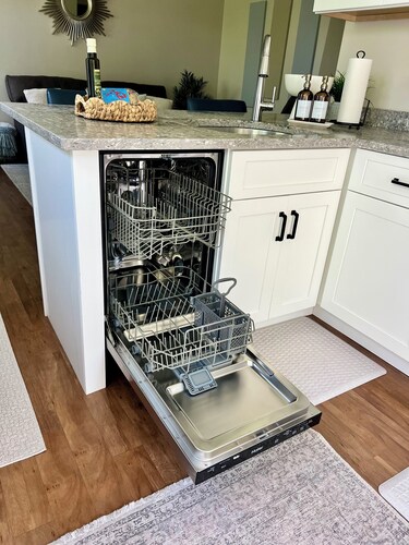 Cozy sunlit apartment steps from downtown Dover. Parking included