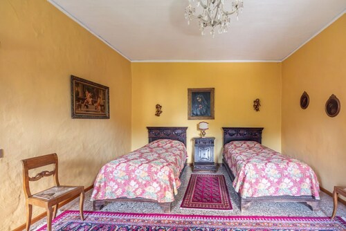Elegant 350 sqm apartment for 6 people, located on two levels of a historic 18th century villa. The villa, with fine furnishings and frescoed galleries, will enchant you with its rooms, where history and comfort blend to give you an unforgettable experie