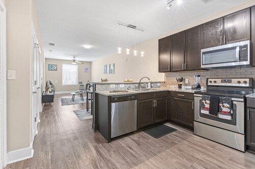 Lavish one bedroom apartment in downtown Birmingham with rooftop stadium views.