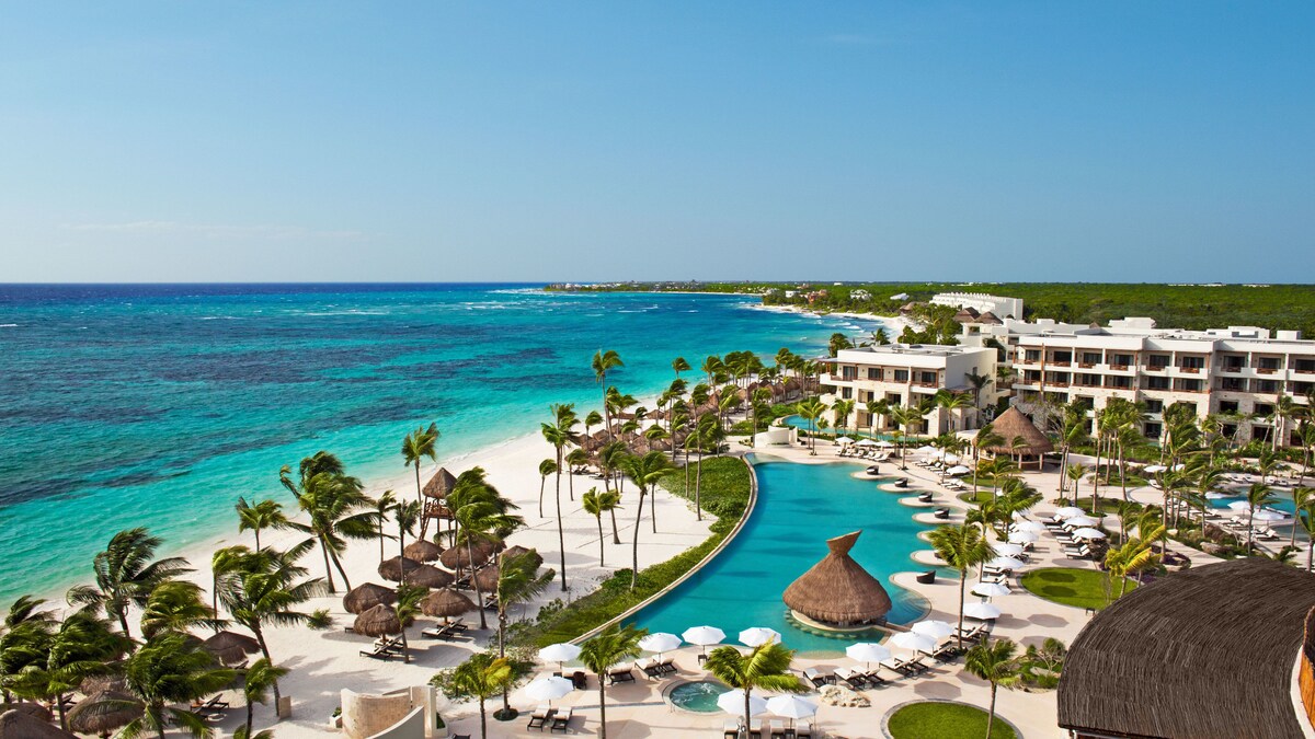 Relax by the pool or on the beach, surrounded by serene ocean views and picturesque scenery.