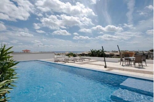 Infinito by Zamá Homes