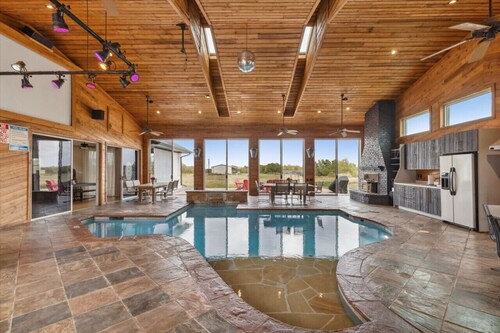 6000 SQFT Estate w/ TX Shaped Indoor Pool + Game Room & Separate Guest House
