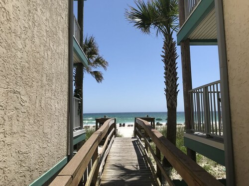 Beachfront corner unit with breathtaking ocean views!