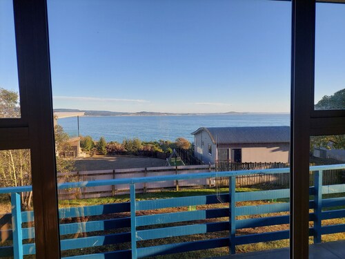 Moeraki village, family sized house stunning views, 50m to the beach.