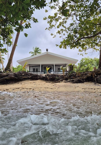 Beachside 1-bedroom container home with AC, WiFi in quiet Ajeltake