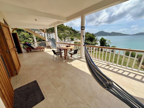 Tranquility Oceanfront Apartment, Carriacou in a quiet rural residential area.