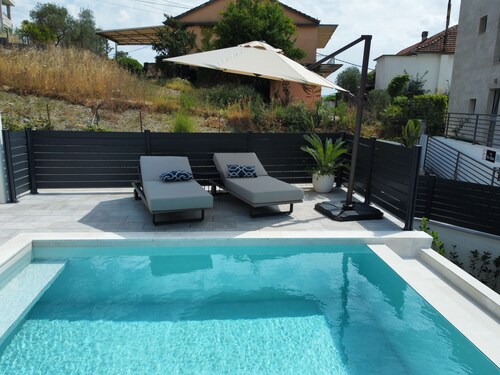 Sea View Villa Aquilla with heated Pool