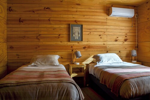 Palafito Entre Mar y Tierra