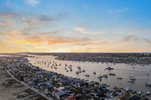 Oceanfront Home Walk to Balboa Pier + Scenic Views Balboa Peninsula Point by Avantstay