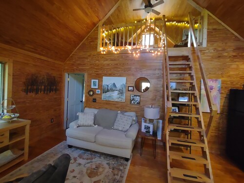 Cozy and quaint, this 1-bedroom cabin w/ loft is a gem.