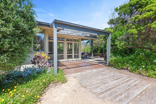 Spacious Coastal 4-bed Steps From the Sand