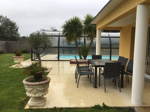Charming family villa with heated indoor pool.