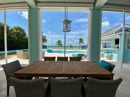 Blue Birds Beach House, right on the beach with a large backyard & heated pool.
