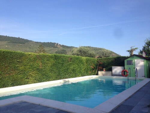 Part of a villa with pool.