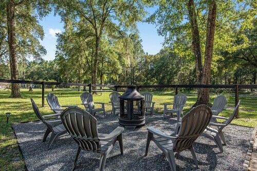 Relaxing 4BR & 2BA on quiet 2 acres • Fenced backyard • Game Room • 7 mi to WEC