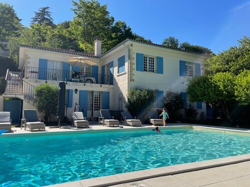 Spacious family villa with large heated pool & sundowner deck in pretty village