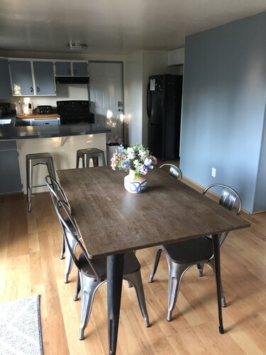 Cozy home next to airport with fenced backyard and lots of sun!