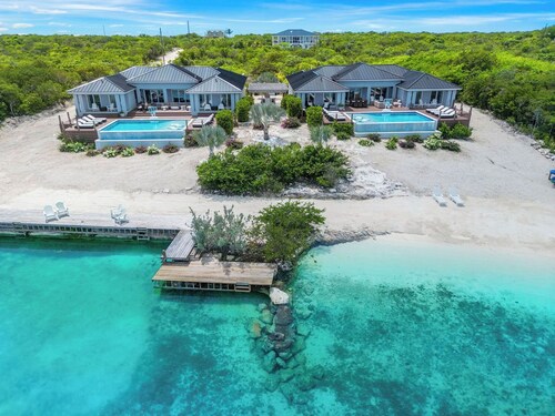 Amazing luxury beach villas with private dock for 20 people! Large heated pools