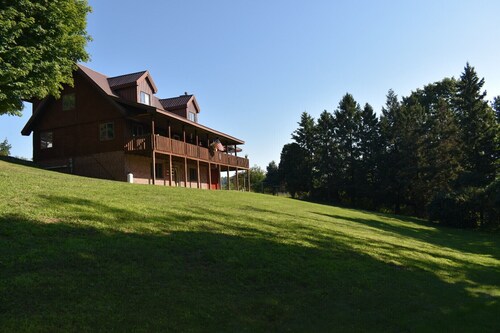 Spacious log cabin overlooking our little town