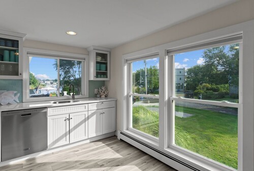 Stunning waterfront home with big yard & dock! Welcome to "A Summer Place"!