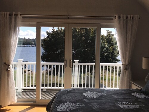 The Tequila Sunrise House is a beautiful waterfront 5 Bedroom home