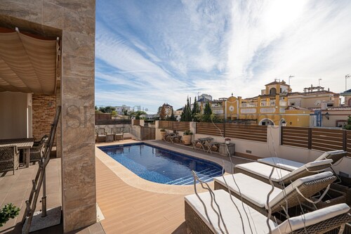Large villa with private pool and walking distance to La Mata beach. Child-friendly.