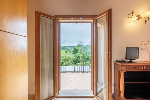 Maison de vacances 'Villetta Allegra' avec vue sur les montagnes, terrasse privée et jardin privé