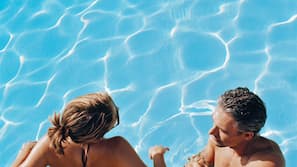 Outdoor pool, open 6:30 AM to 10:00 PM, pool umbrellas, sun loungers