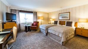 Literie hypoallergénique, minibar, coffre-forts dans les chambres