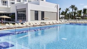 2 outdoor pools, pool umbrellas, pool loungers