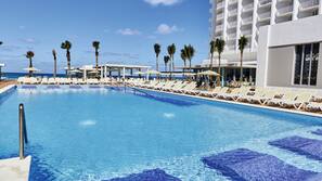 2 outdoor pools, pool umbrellas, pool loungers